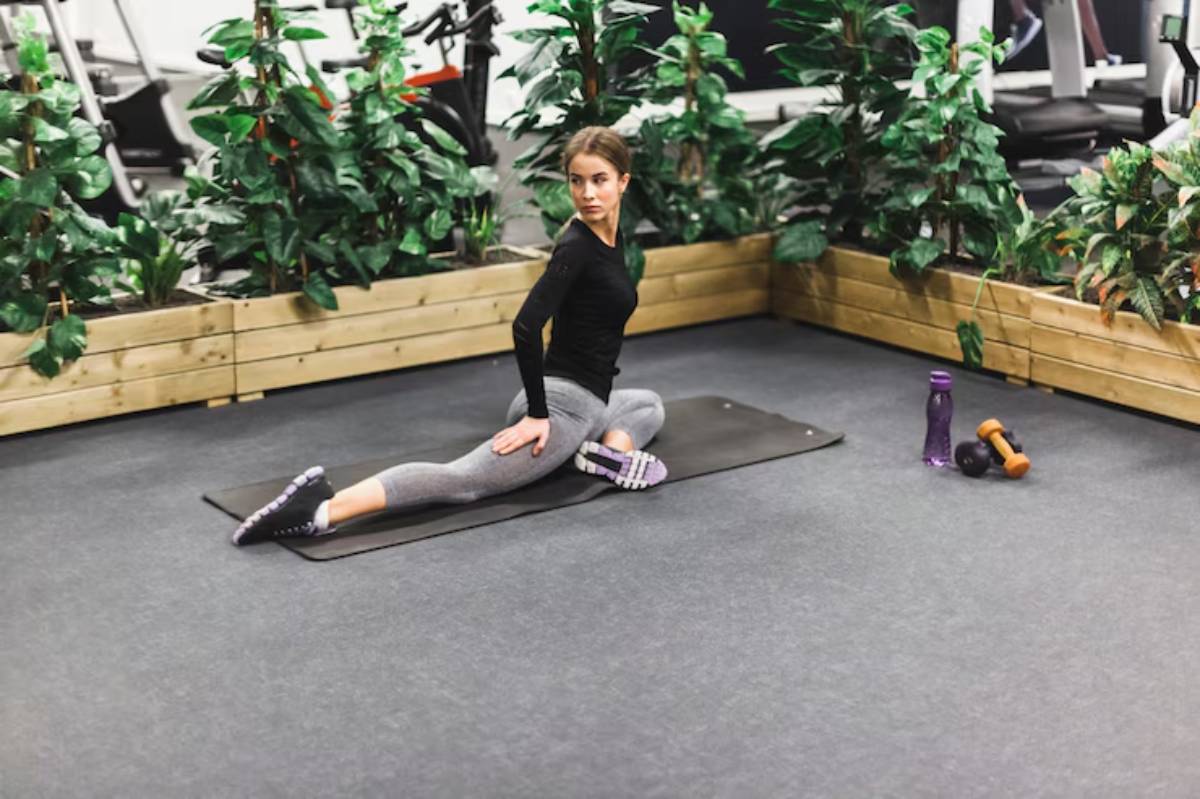 Post-lift pigeon pose stretch for hip recovery and mobility