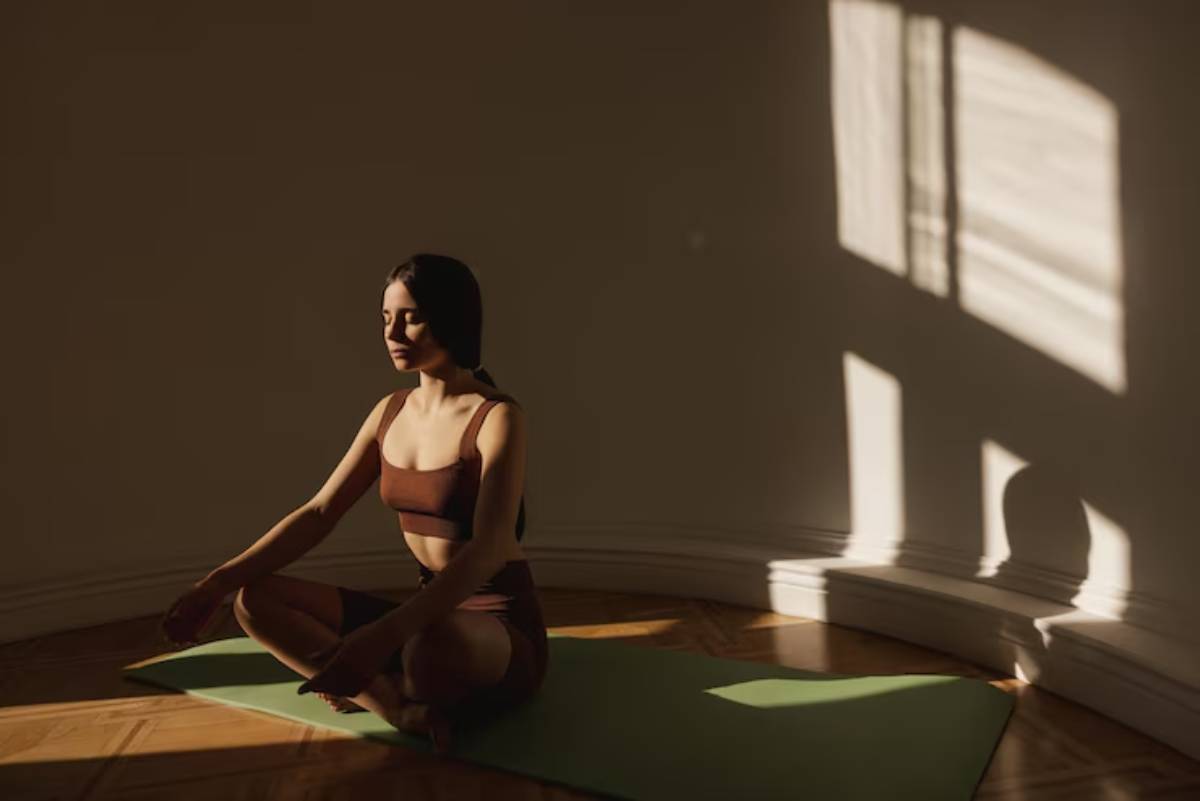 Gentle yoga pose being used for muscle recovery and relaxation